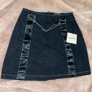 Black skirt with chain belt in front
